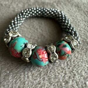 Floral Beaded ring with Silver Accents